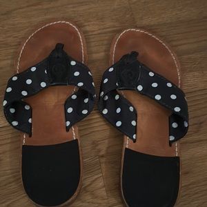 Gently worn polka dot flip flops